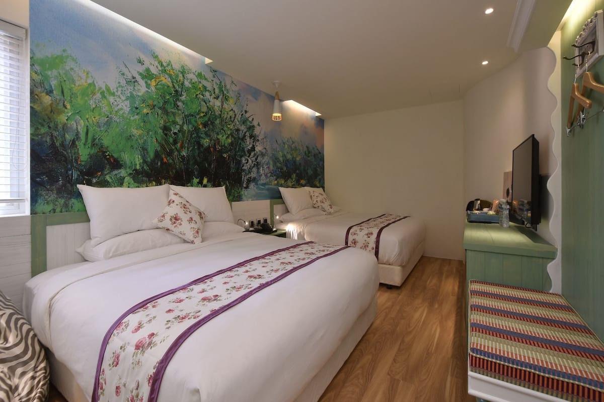 Deluxe Quadruple Room (Photos are for reference only - themes are randomly arranged)