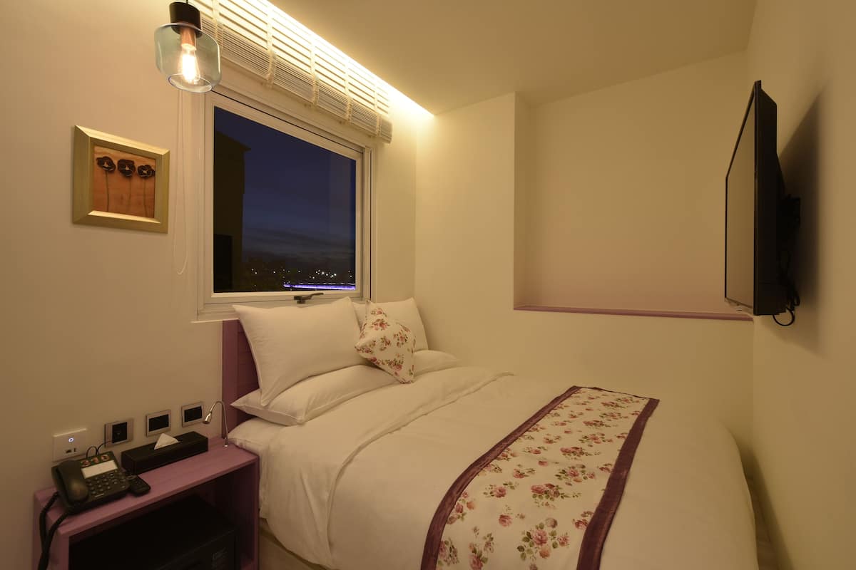 Economy Double Room (Photos are for reference only - themes are randomly arranged)