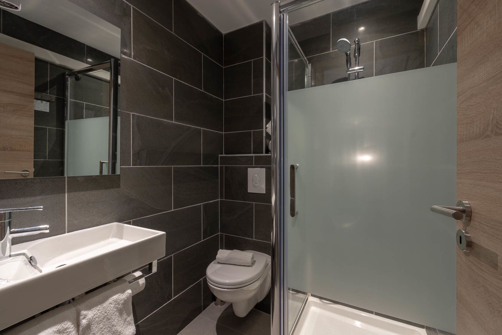 family room | bathroom | shower, free toiletries, hair dryer, towels