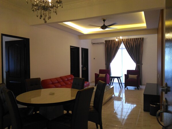 Apartment, 3 Bedrooms | Living room | Flat-screen TV