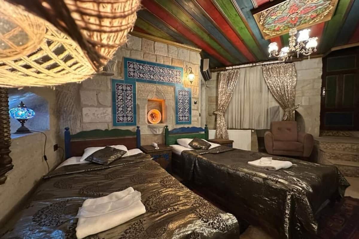 (201) Deluxe Cave Suite | Egyptian cotton sheets, premium bedding, down comforters