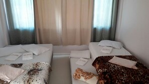 Apartamento standard | Frigobar, cortinas blackout, Wi-Fi de cortesia