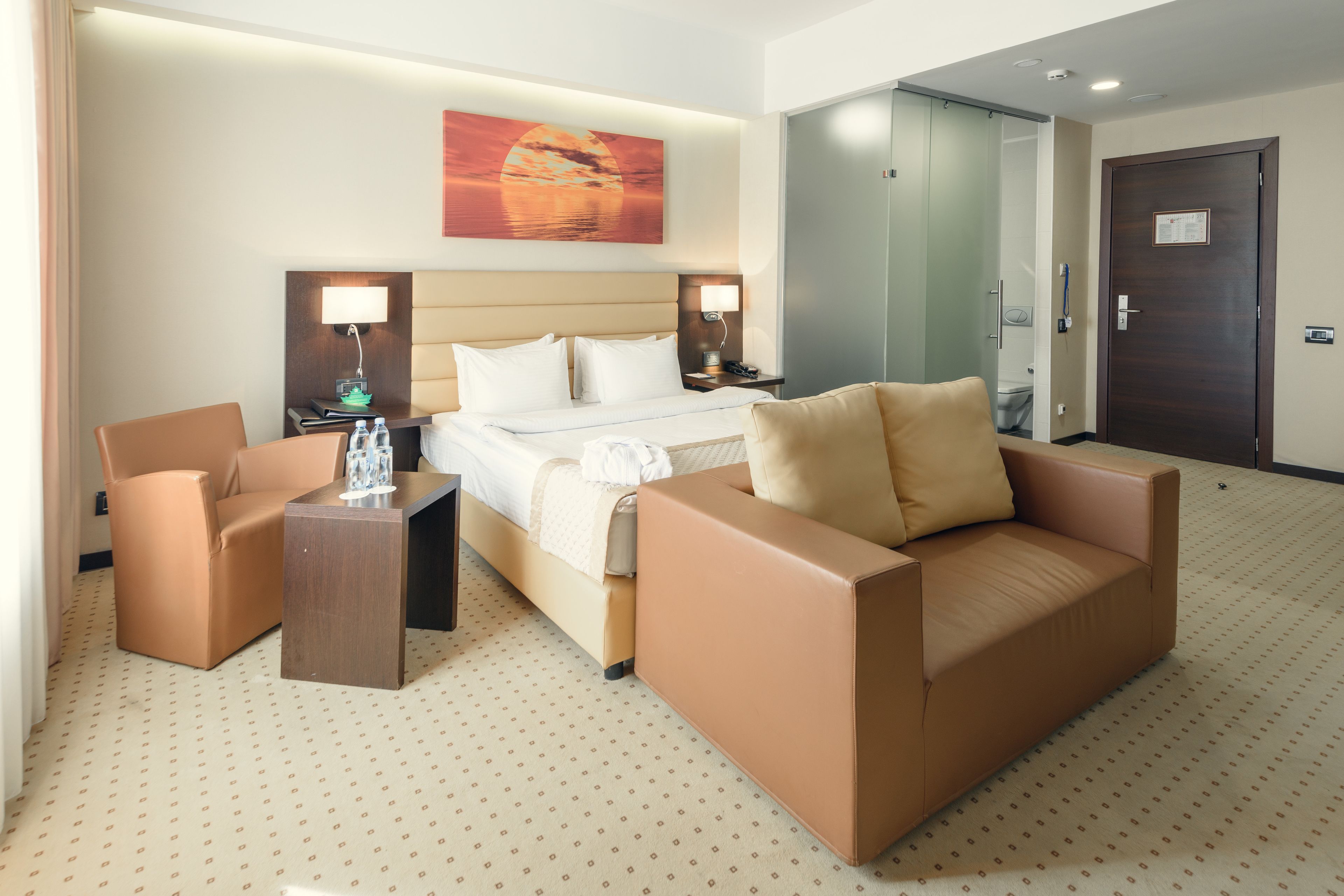 deluxe room | minibar, in-room safe, desk, blackout curtains