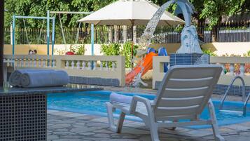 Outdoor pool, pool umbrellas, pool loungers