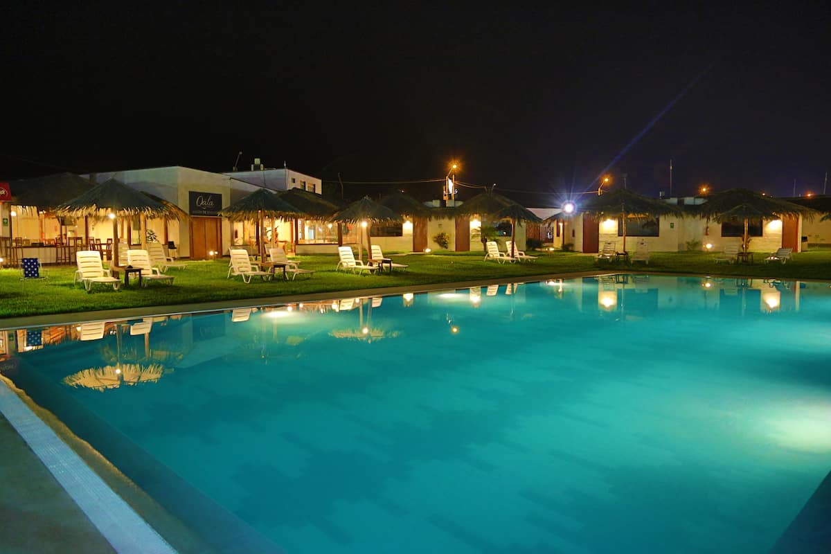 outdoor pool, open 9:00 am to 9:00 pm, pool umbrellas, pool loungers