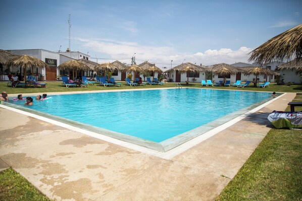 Outdoor pool, open 9:00 AM to 9:00 PM, pool umbrellas, sun loungers - QALA Hotel & Resorts (Grocio Prado)