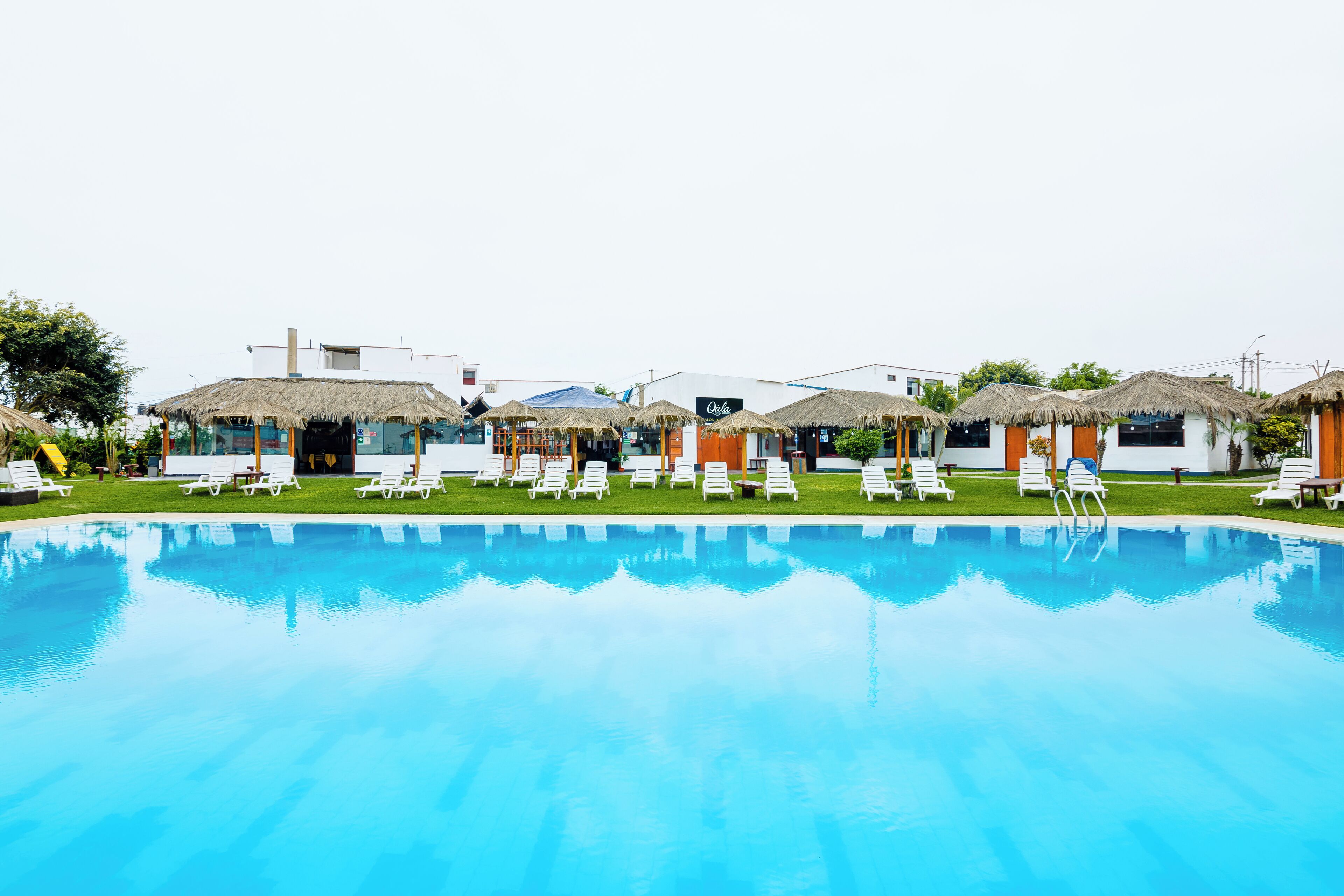 outdoor pool, open 9:00 am to 9:00 pm, pool umbrellas, pool loungers
