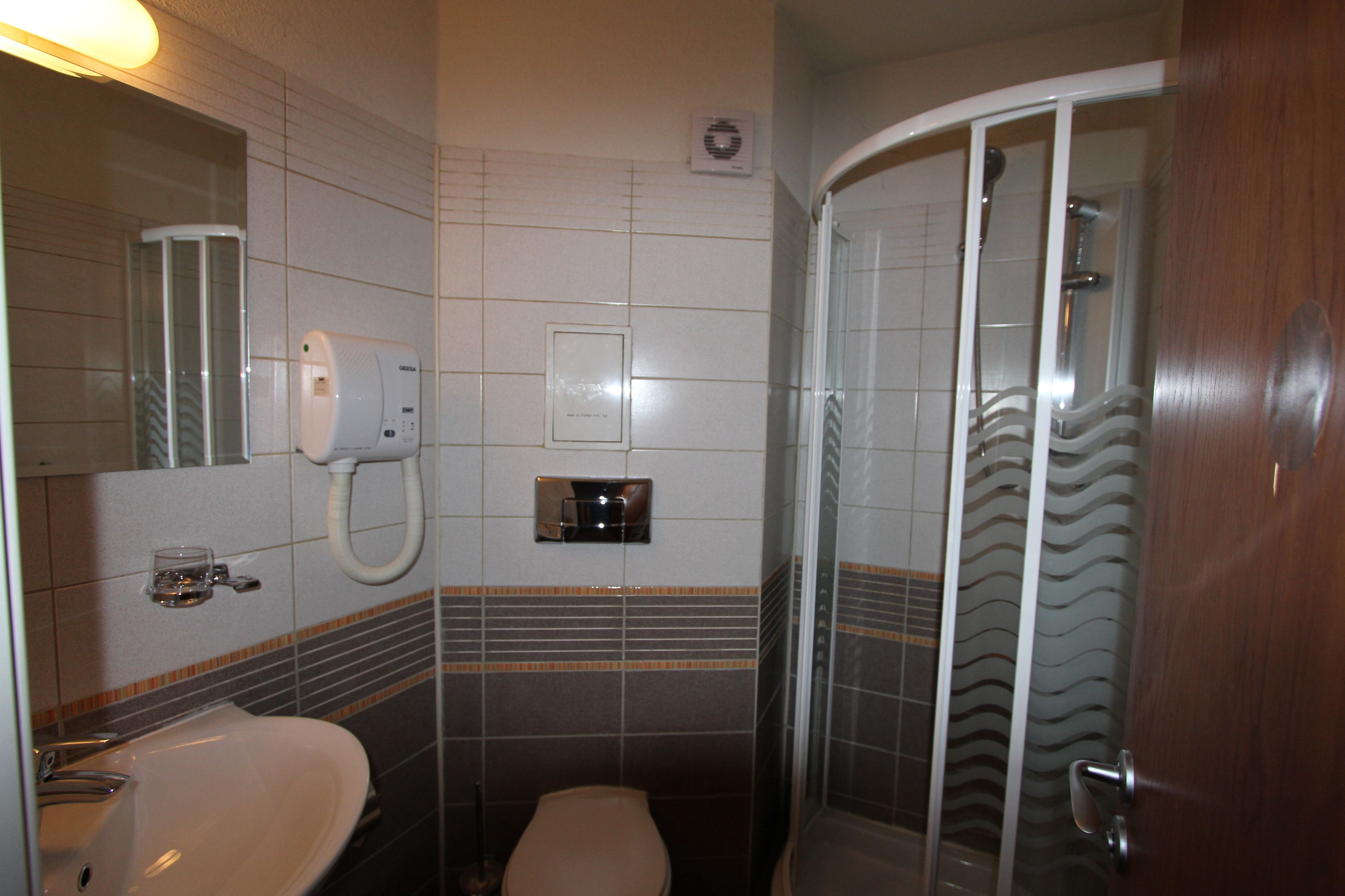 superior triple room (free spa access) | bathroom | free toiletries, hair dryer, bathrobes, towels