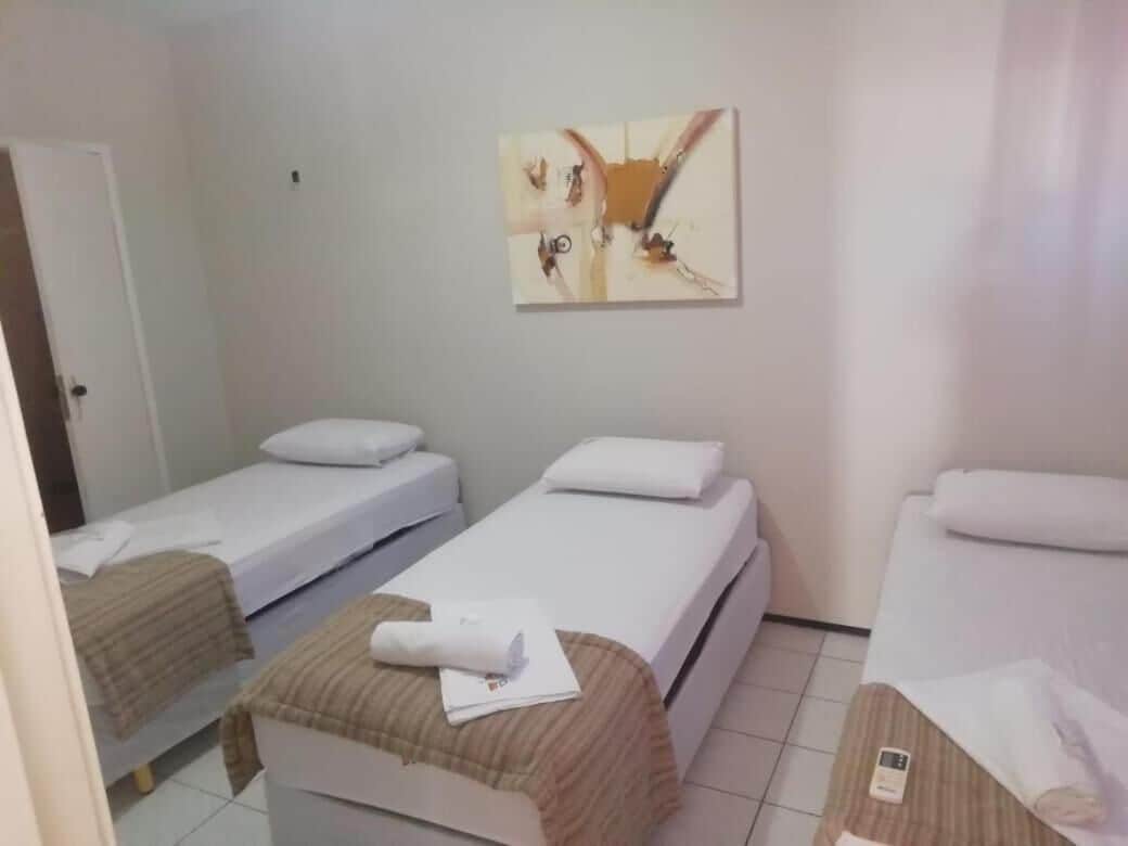 Standard Triple Room | Minibar, blackout drapes, iron/ironing board, free WiFi