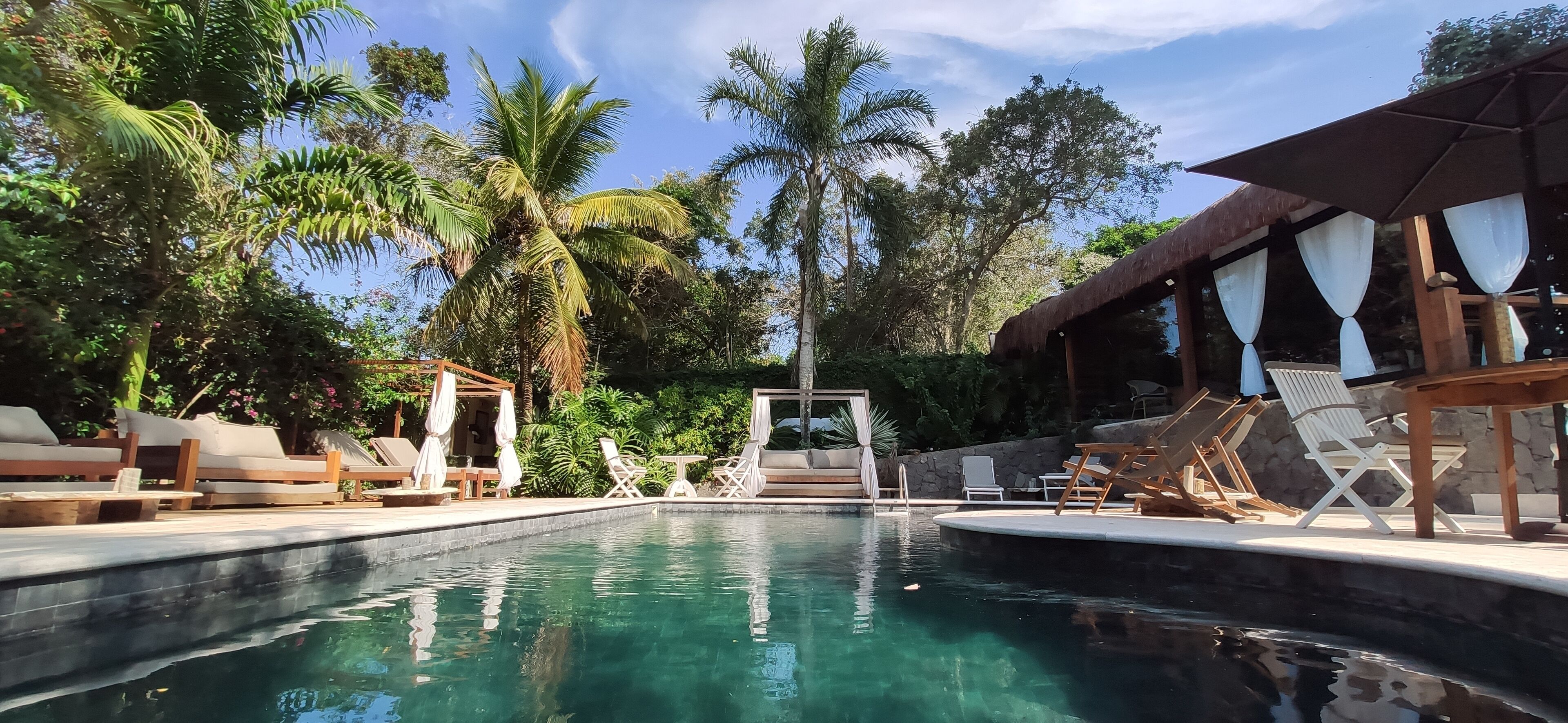 outdoor pool, open 9:00 am to 10:00 pm, pool umbrellas, pool loungers