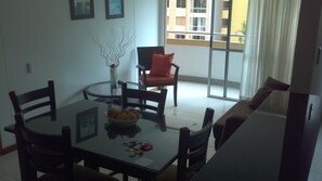 Business Apartment, 1 Bedroom, Kitchen, City View | Living area | Flat-screen TV - Tuamoblado (Medellín)