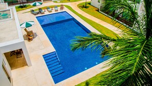 Outdoor pool, pool umbrellas, sun loungers