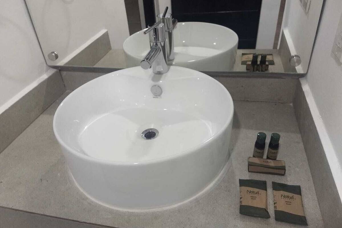 double room, 2 double beds | bathroom | shower, free toiletries, hair dryer, towels