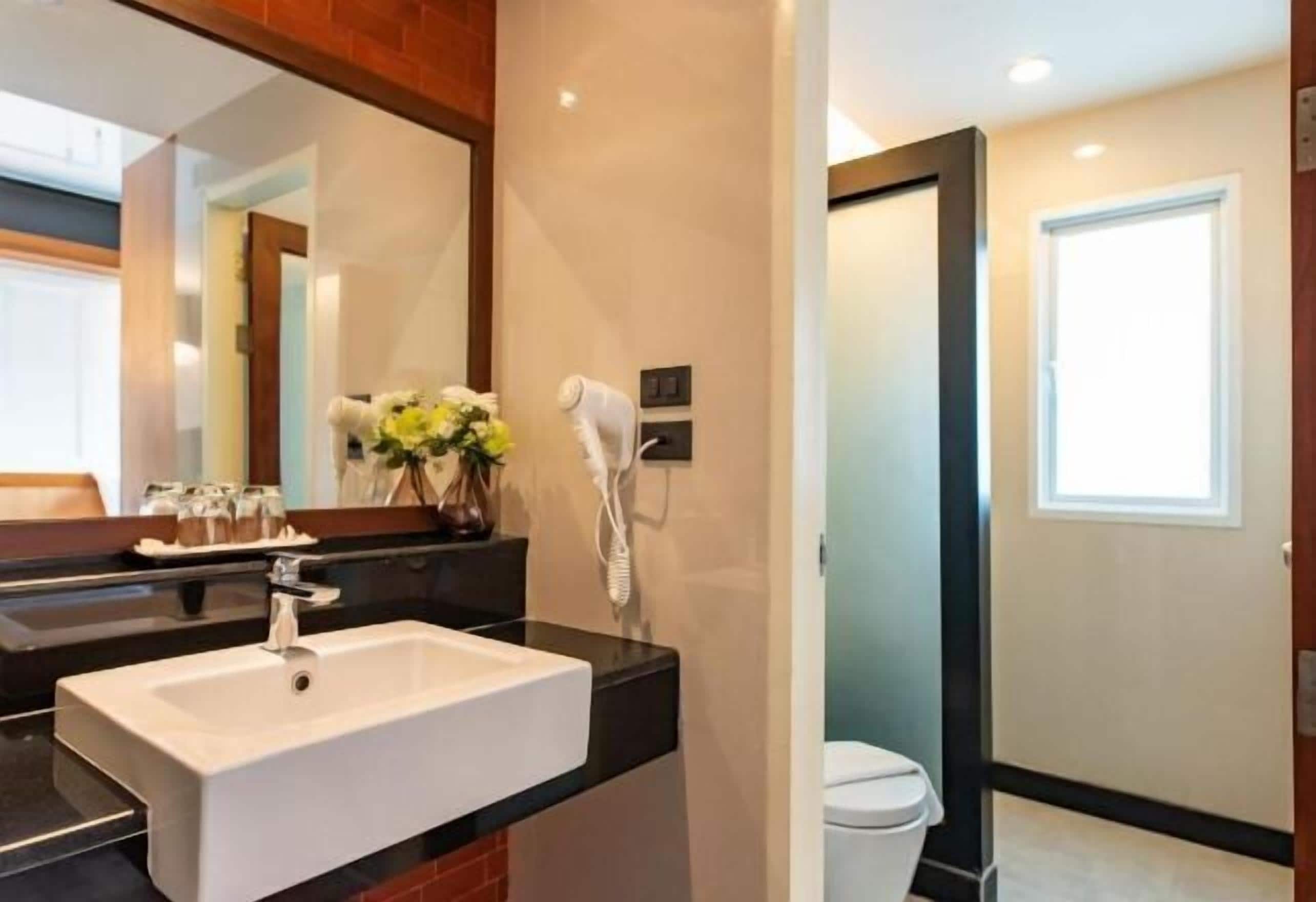 Bathroom | Shower, free toiletries, hair dryer, bathrobes