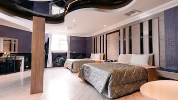 Grand Quadruple Room | Individually decorated, individually furnished, desk, blackout drapes