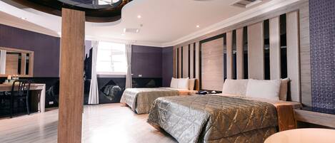 Grand Quadruple Room | Individually decorated, individually furnished, desk, blackout drapes