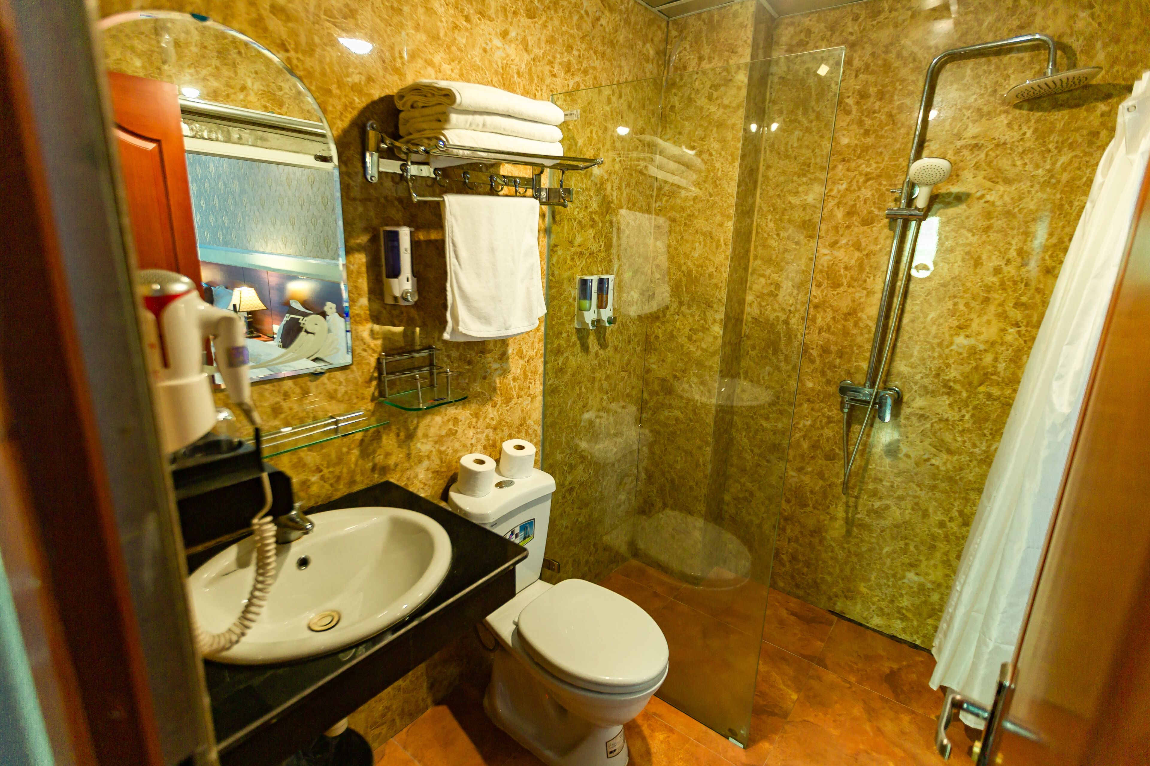 shower, free toiletries, hair dryer, slippers