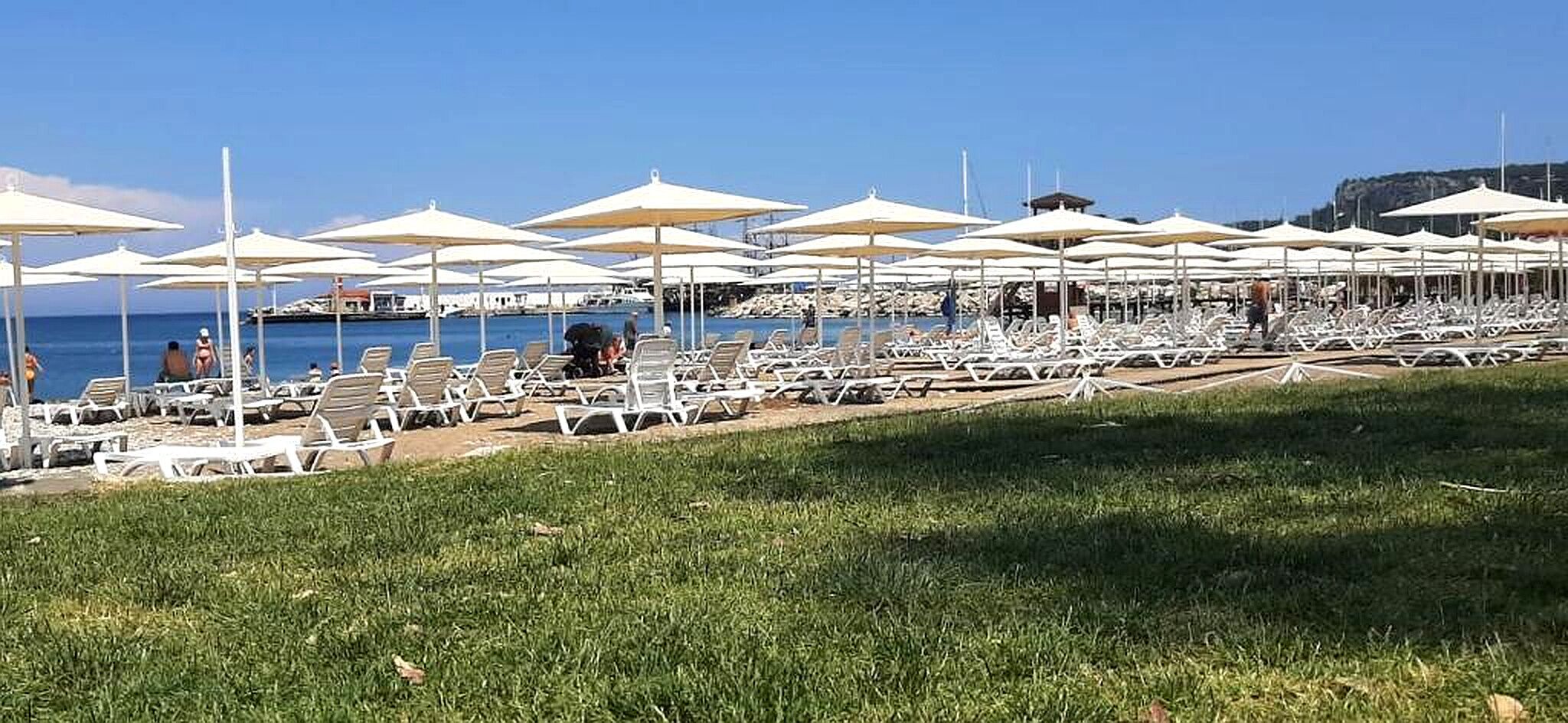 Beach nearby, sun loungers, beach umbrellas
