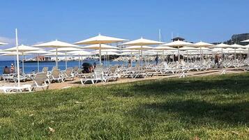 Beach nearby, sun loungers, beach umbrellas