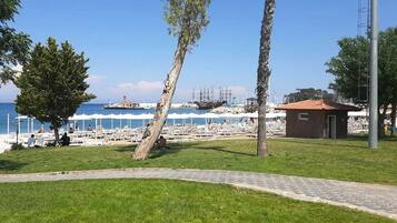 Beach nearby, sun loungers, beach umbrellas