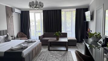 Suite familiare | Biancheria da letto di alta qualità, minibar, una cassaforte in camera