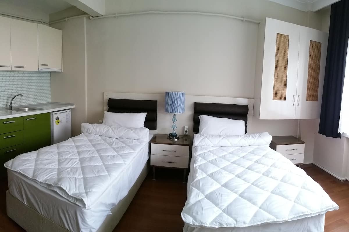 In-room safe, desk, iron/ironing board, free cribs/infant beds