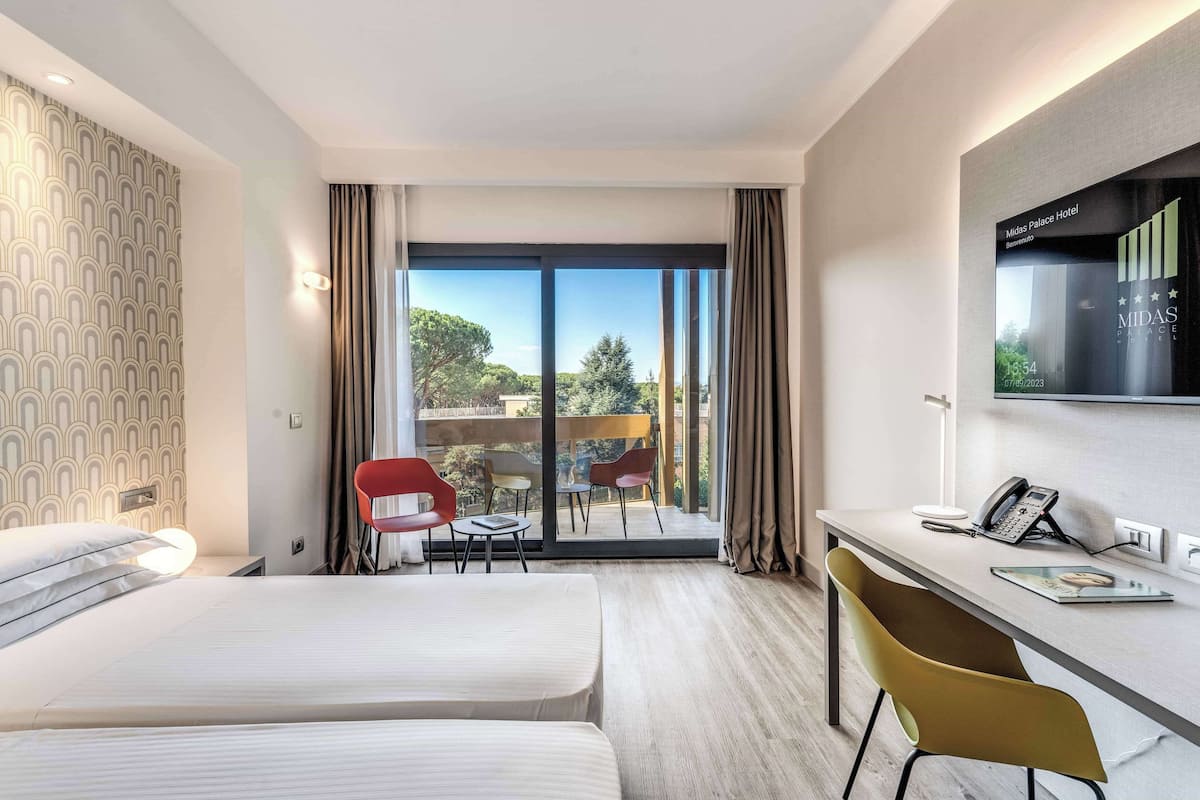 Habitación ejecutiva, balcón | Ropa de cama de alta calidad y minibar