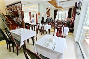Breakfast, lunch, dinner served; local cuisine