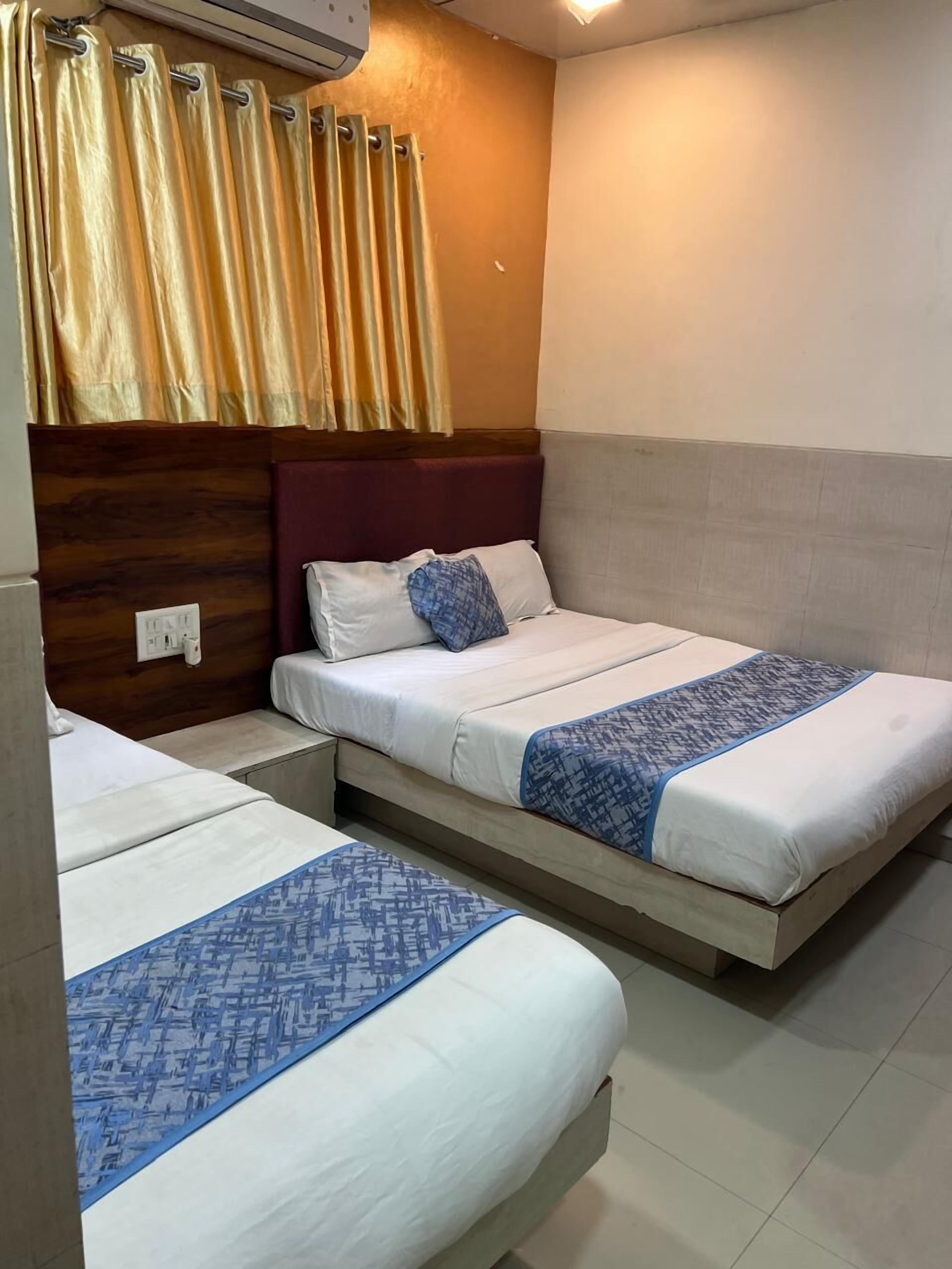 Habitación triple estándar | Wifi gratis y ropa de cama