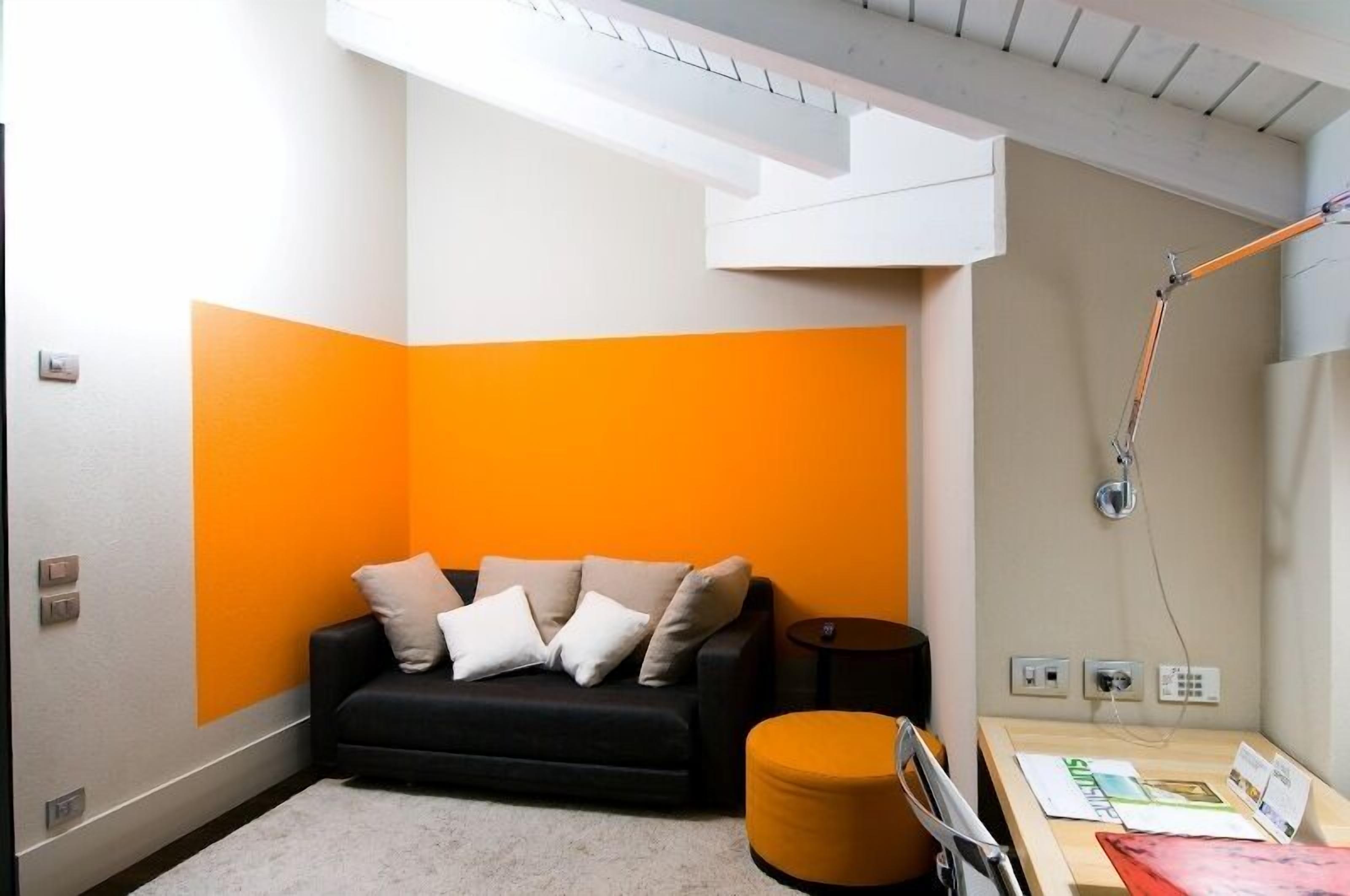 design suite, jetted tub (spa suite) | living room | flat-screen tv