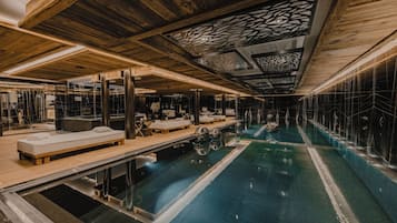 Indoor pool, open 10:00 AM to 8:00 PM, pool loungers