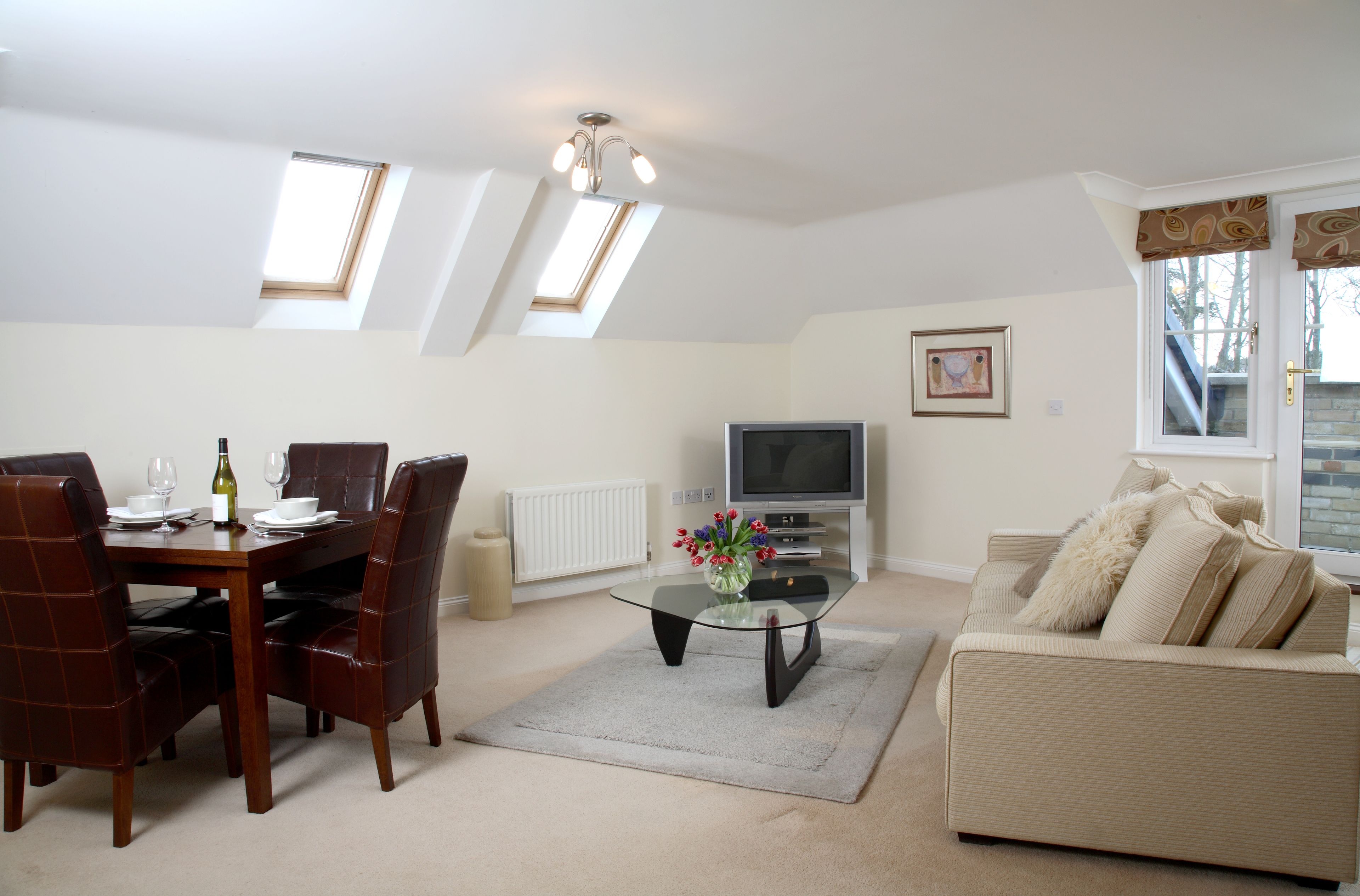Executive Apartment, 2 Bedrooms (City Center / Home-for-Home) | Living room | Flat-screen TV, DVD player, pay movies