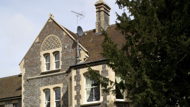 A large, historic building with multiple windows and a prominent chimney. - Sherborne House (Basingstoke)