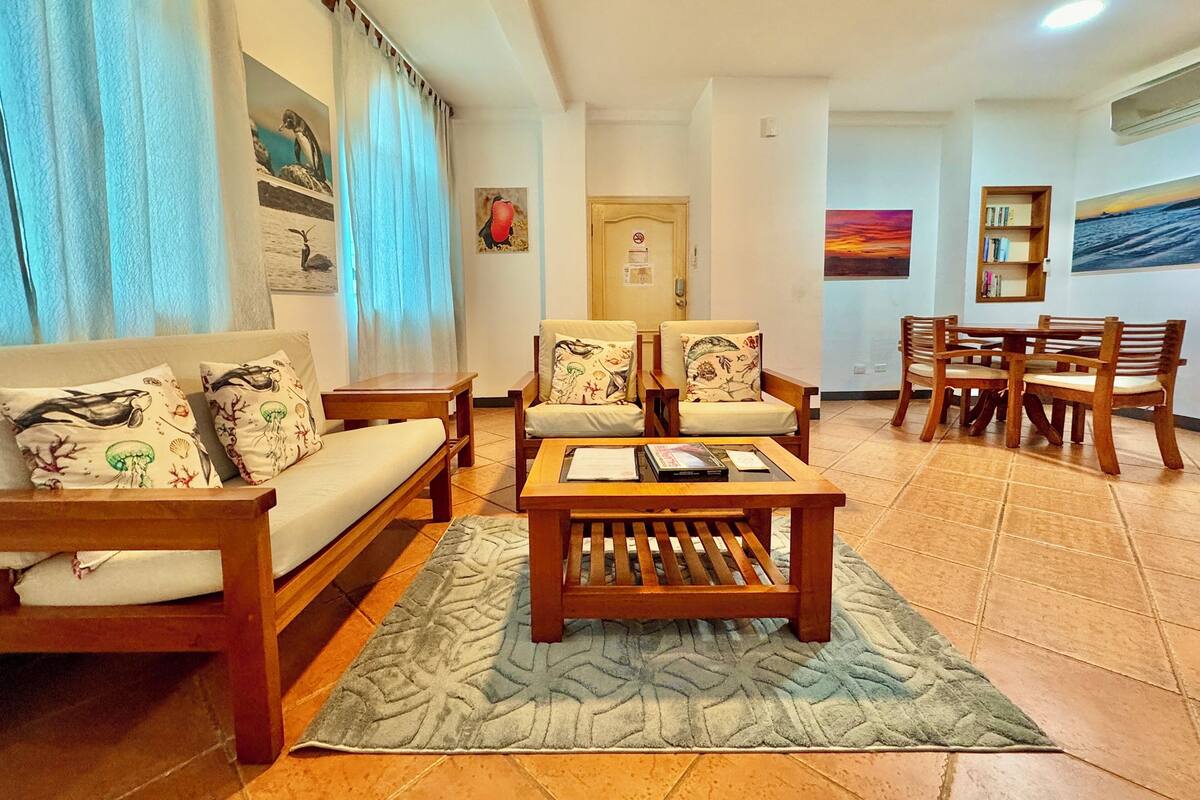 Deluxe Suite, 4 Bedrooms, Garden View | Living area | Flat-screen TV
