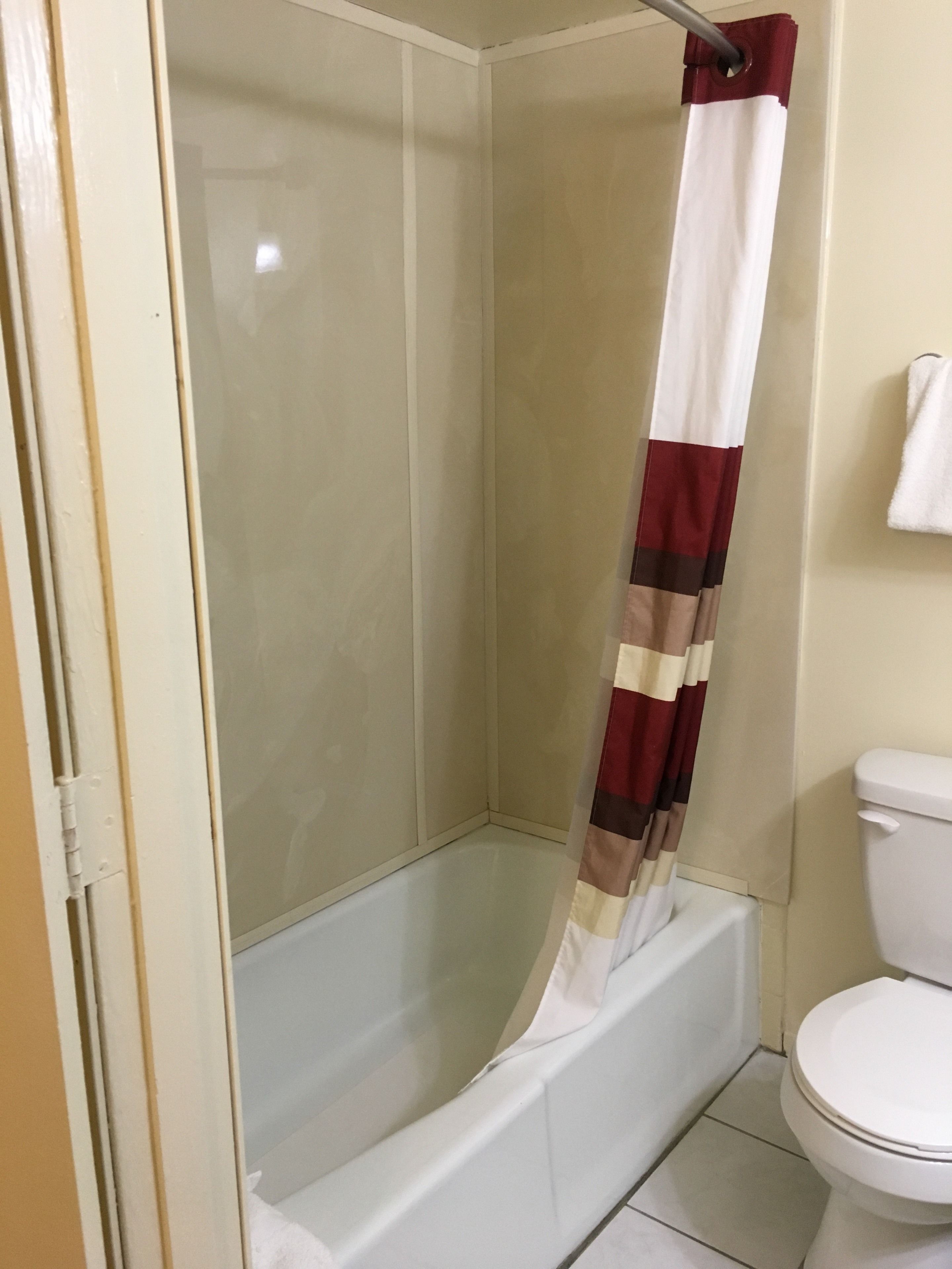 combined shower/bathtub, free toiletries, towels
