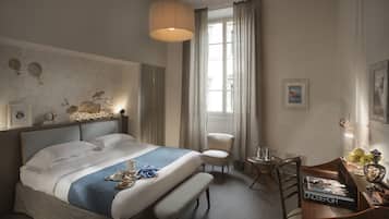 Hypo-allergenic bedding, down duvets, minibar, in-room safe