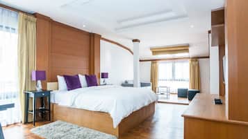 Apartment, 1 Bedroom, City View | Premium bedding, in-room safe, desk, iron/ironing board