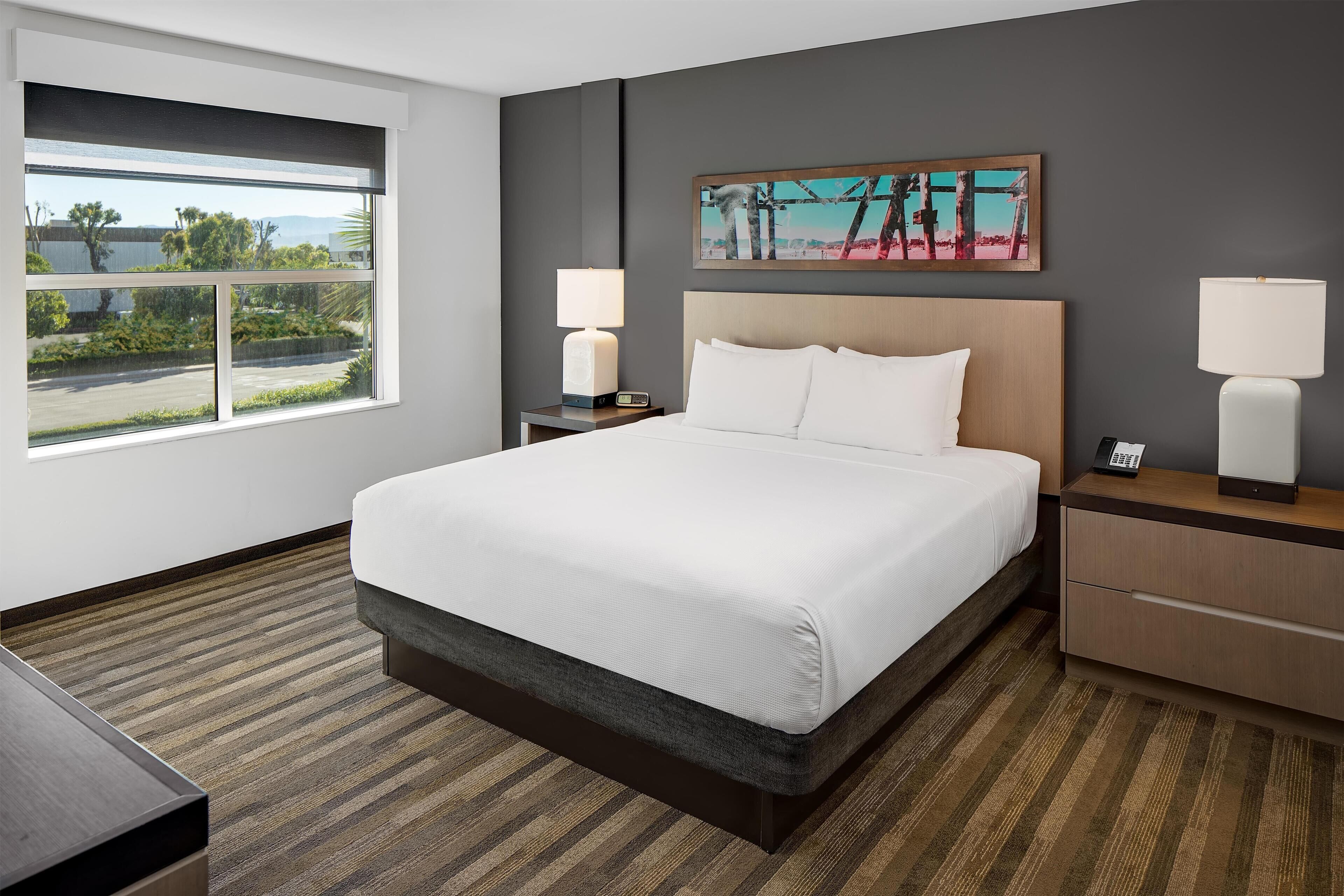 Hypo-allergenic bedding, down duvets, pillow-top beds, desk