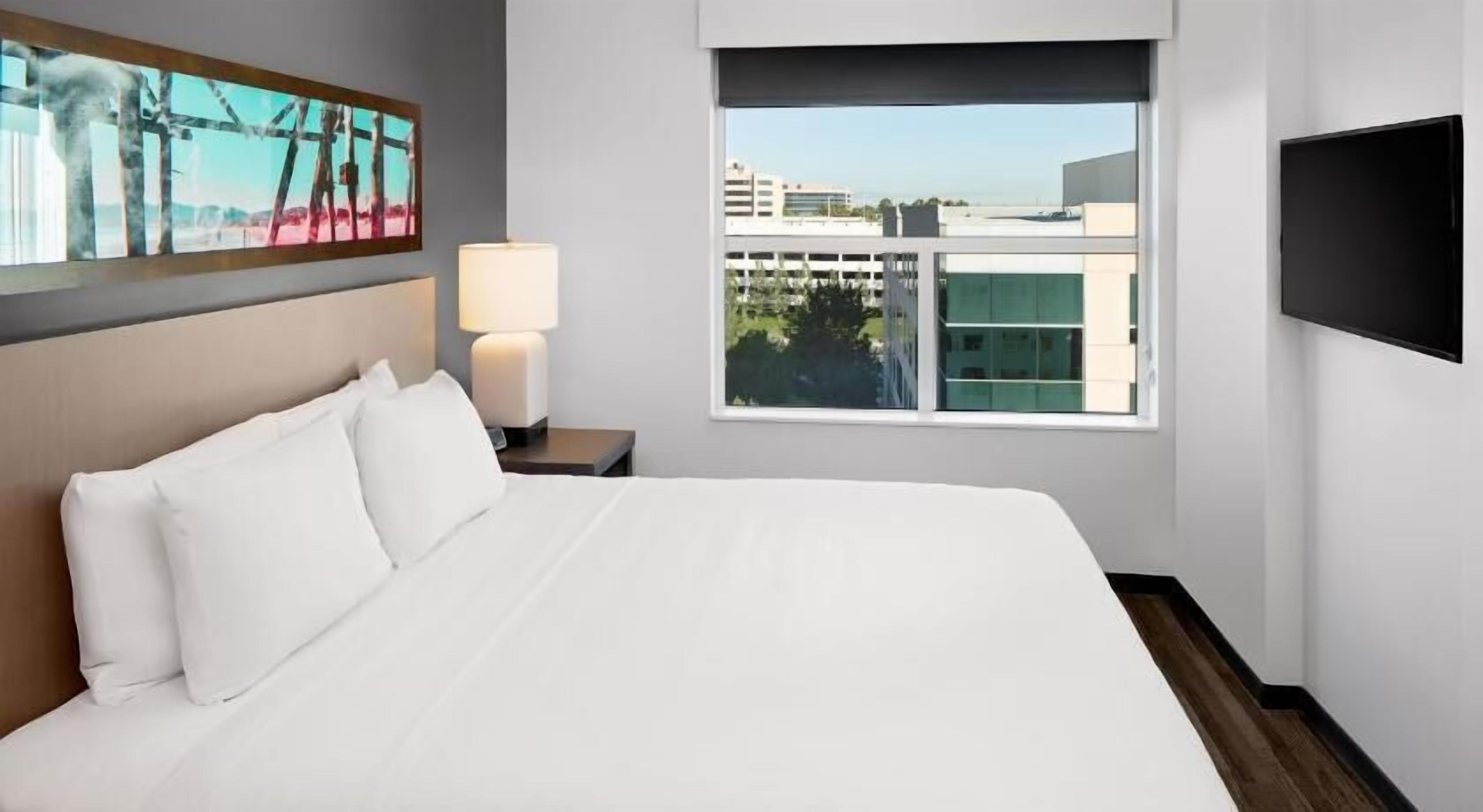 Hypo-allergenic bedding, down duvets, pillow-top beds, desk