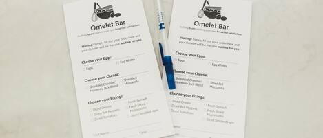 Two Omelet Bar menus with options for eggs, cheese, and fixings.