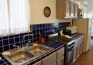 Comfort Apartment, 1 Bedroom, Ocean View, Sea Facing | Private kitchen | Fridge, microwave, coffee/tea maker - Caracol Peninsula 547 2 Studios del Caracol 1 Bedroom Apartment By Seaside San Carlos (San Carlos)