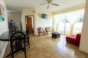 Family Apartment, 2 Bedrooms, Balcony, Park View | Living area | 32-inch LCD TV with cable channels, TV
