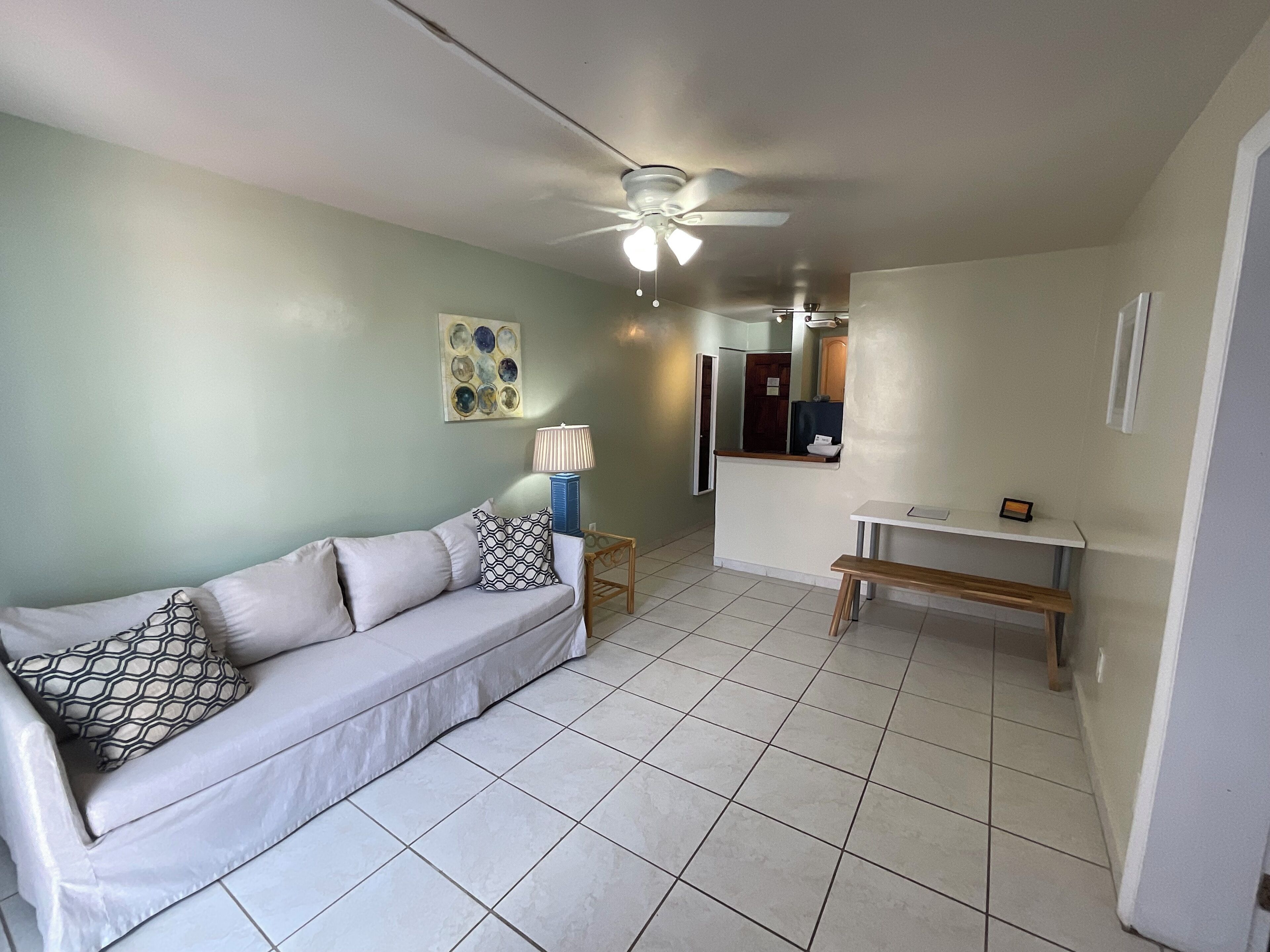 business suite, 1 queen bed, kitchenette, courtyard view | living area | 43-inch smart tv with digital channels, tv, streaming services