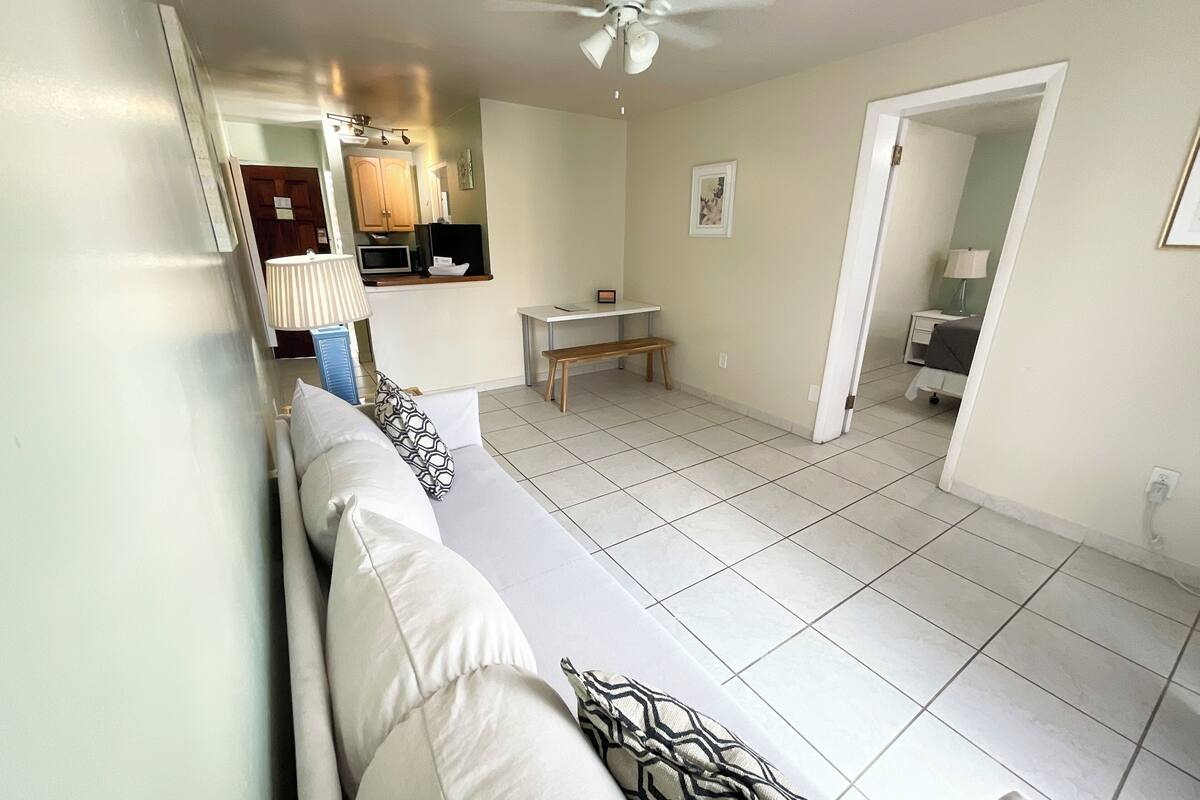 business suite, 1 queen bed, kitchenette, courtyard view | living area | 43-inch smart tv with digital channels, tv, streaming services