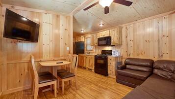 Premium Cottage, 2 Bedrooms (No Linens provided) | Living area | Flat-screen TV