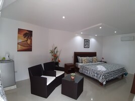 Habitación Deluxe doble, vistas parciales al mar, frente a la playa | Vistas desde la habitación