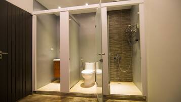 Economy Quadruple Room | Bathroom | Free toiletries, slippers, towels