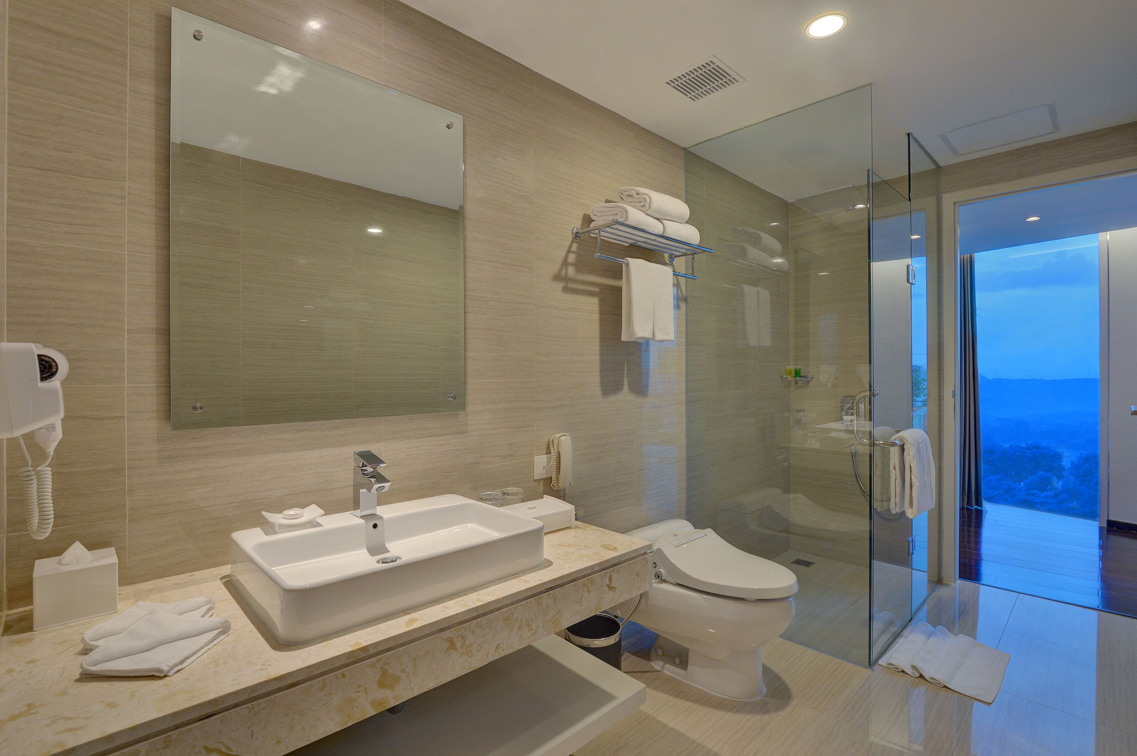 free toiletries, hair dryer, slippers, bidet