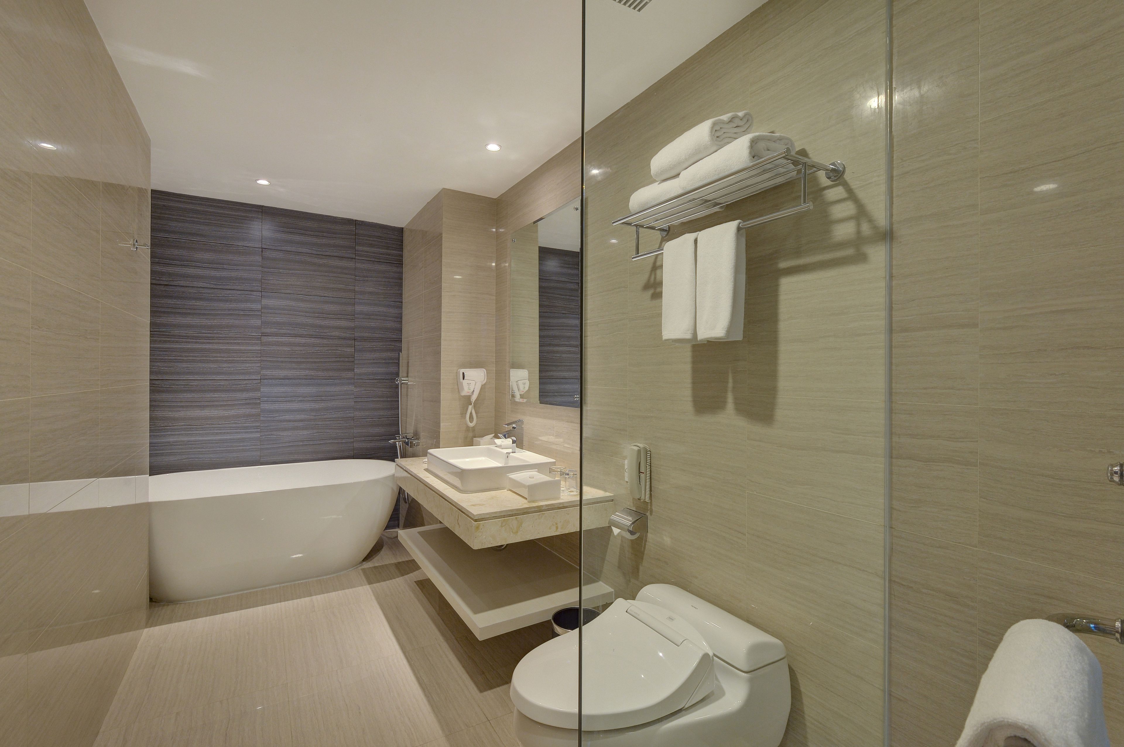 free toiletries, hair dryer, slippers, bidet