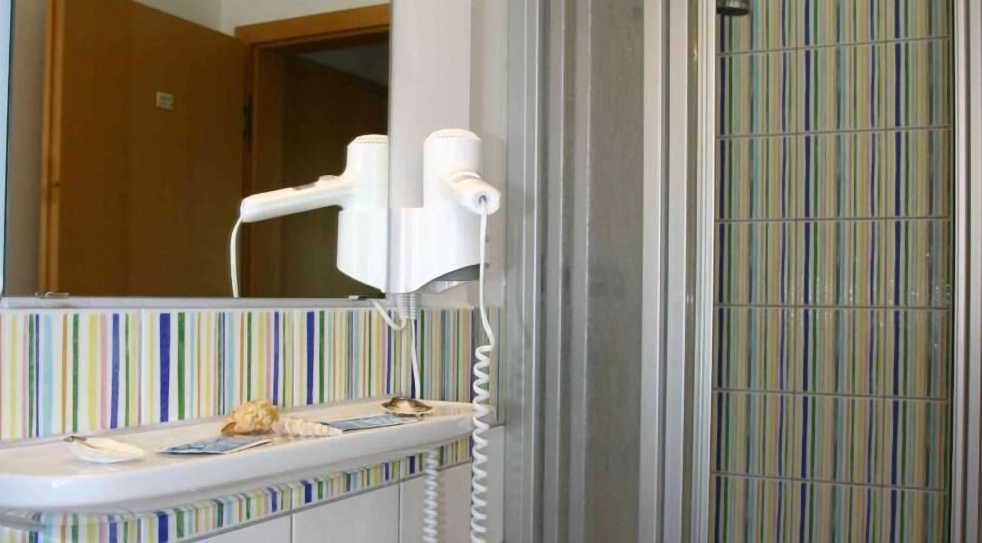single room | bathroom amenities | free toiletries, hair dryer, towels, soap